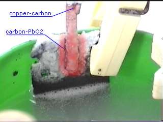 [Picture of polystyrene substrate anode in action]